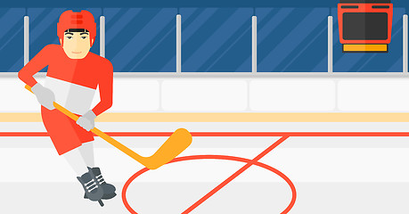 Image showing Ice-hockey player with stick.