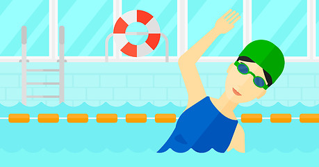 Image showing Swimmer training in pool.