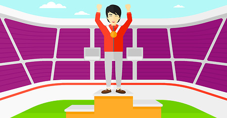 Image showing Athlete with medal and hands raised.