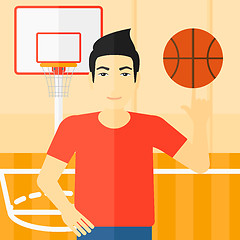 Image showing Basketball player spinning ball.