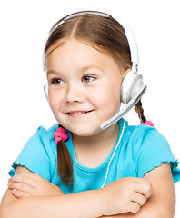 Image showing Young girl is working as an operator at helpline