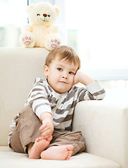 Image showing Portrait of a little boy with his teddy bear