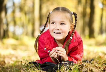 Image showing Portrait of a little girl in autumn park