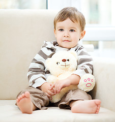Image showing Portrait of a little boy with his teddy bear