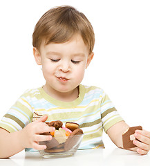 Image showing Portrait of a boy with cookies