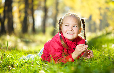 Image showing Portrait of a little girl in autumn park