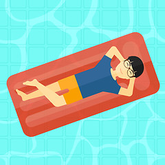 Image showing Man relaxing in swimming pool.