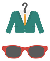 Image showing Suit on hanger and sunglasses.