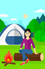 Image showing Woman sitting at camp.