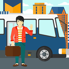 Image showing Man standing near bus.