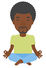 Image showing Man meditating in lotus pose.