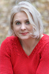 Image showing Blonde in a red pullover