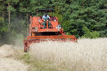 Image showing red combine harvester