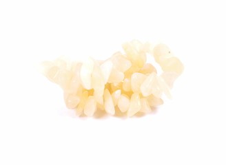 Image showing Splintered orange calcite chain on white background