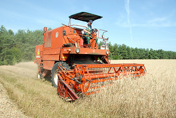 Image showing red combine harvester