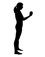 Image showing Silhouette of woman doing exercises