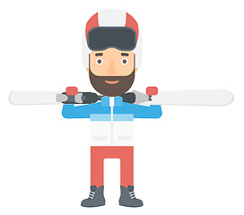 Image showing Man holding skis.