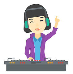 Image showing Smiling DJ with console.