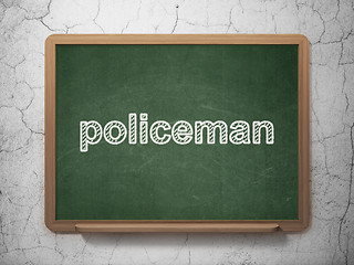 Image showing Law concept: Policeman on chalkboard background