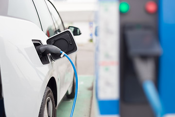 Image showing Electric Car in Charging Station.