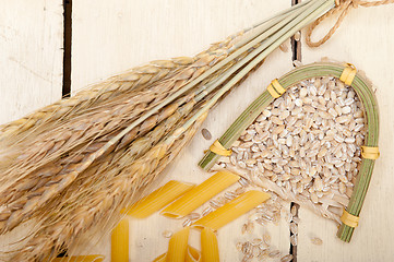 Image showing Italian pasta penne with wheat