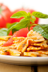 Image showing Italian pasta farfalle butterfly bow-tie and tomato sauce