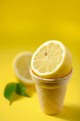 Image showing Cut lemon fruit in ice cream cone