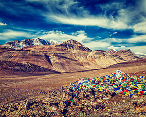 Image showing Buddhist prayer flags lungta at mountain pass in Himalayas