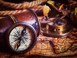 Image showing Old vintage compass on ancient map