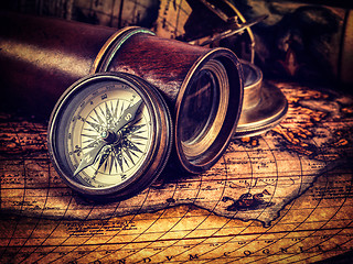 Image showing Old vintage compass on ancient map