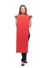 Image showing Woman holding red blank cardboard