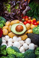 Image showing Assorted raw vegetables on wooden background