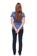 Image showing Back view of young female standing in full length