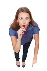 Image showing Female blowing a whistle and pointing at you