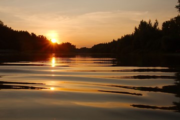 Image showing Sunset over a river