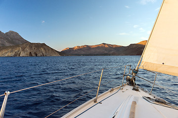 Image showing Prow of sailing boat and seacoast