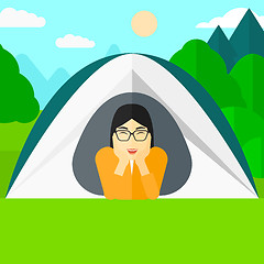 Image showing Woman lying in tent.