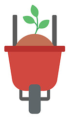 Image showing Wheelbarrow with sand and sprout.