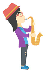 Image showing Woman playing saxophone.