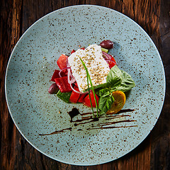 Image showing Fresh Greek salad in a bowl,