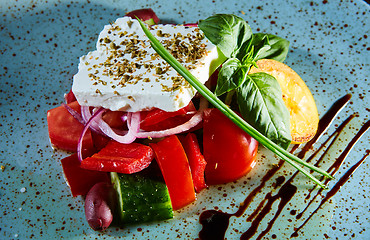 Image showing Fresh Greek salad in a bowl,