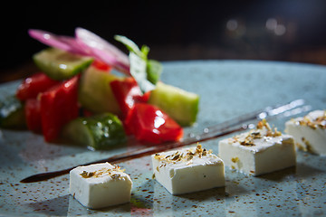 Image showing Fresh Greek salad in a bowl,