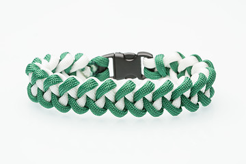 Image showing green braided bracelet on white background