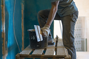 Image showing Builder makes repairs of walls