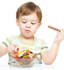 Image showing Portrait of a boy with cookies