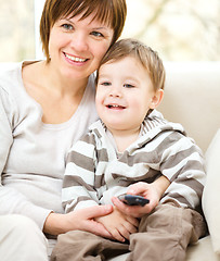 Image showing Mother and her son are watching tv