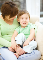 Image showing Mother and her son are watching tv