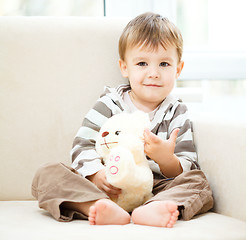 Image showing Portrait of a little boy with his teddy bear