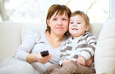 Image showing Mother and her son are watching tv