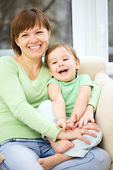 Image showing Mother and her son are watching tv